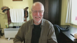 A person wearing glassesDescription automatically generated with low confidence